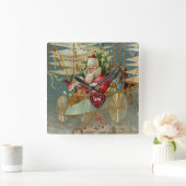 Santa en zijn verbazingwekkende vliegende machinew vierkante klok (Huis)