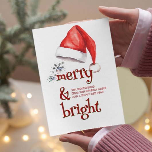 Santa Hat en Snowflakes vrolijk en helder Feestdagenkaart