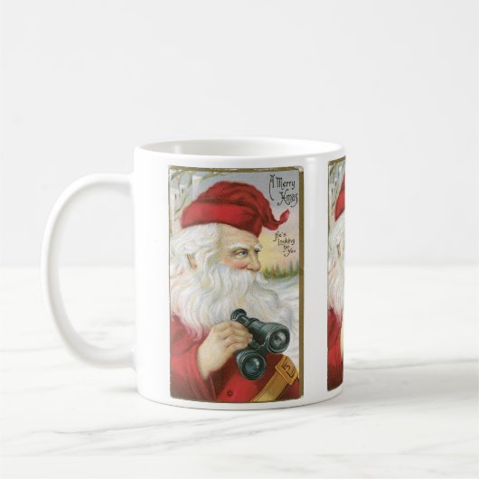 Santa, "Hij zoekt je!" Koffiemok (Links)