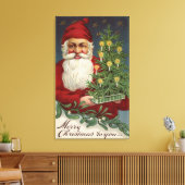 Santa Holding Candlelit Tree Canvas Afdruk (Insitu (Woonkamer))