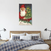 Santa Holding Candlelit Tree Canvas Afdruk (Insitu (Slaapkamer))