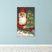 Santa Holding Candlelit Tree Canvas Afdruk (Insitu (Houten vloer))