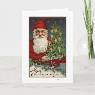 Santa Holding Candlelit Tree Feestdagen Kaart