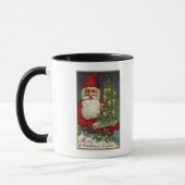 Santa Holding Candlelit Tree Mok (Links)