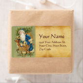 SANTA MET DEER EN CHRISTMAS GIFTEN IN WINTERSNEEUW ETIKET (Insitu)