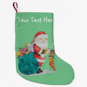 santa met groene zak vol kerstcadeaus kleine kerstsok (Voorkant)
