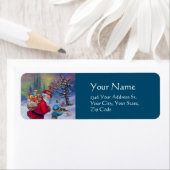 SANTA MET TOYS EN KIND IN DE WINTER SNEEUW ETIKET (Insitu)