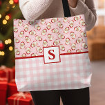 Santa Pink Gingham Monogrammed Christmas Tote Bag<br><div class="desc">Voeg een persoonlijk tintje toe aan uw vakantiestijl met deze Santa Claus monogrammed canvas tas. Met een prachtig retro Santa-ontwerp in combinatie met een klassiek roze ginghampatroon, kan deze canvas tas worden aangepast aan uw initiaal, waardoor het een uniek en feestelijk accessoire is. Ideaal voor vakantiegangers, het dragen van geschenken,...</div>