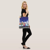 Santa ride scooter in de nachtstad tote bag (Op model)