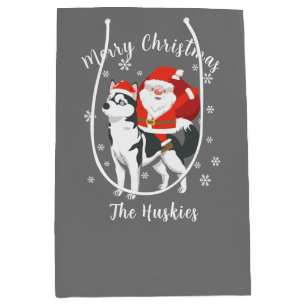 Santa Riding a Husky Dog Merry Kerstmis Medium Cadeauzakje