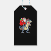 Santa Riding Dinosaur T Rex kerstjongens Man Xma Cadeaulabel (Achterkant)