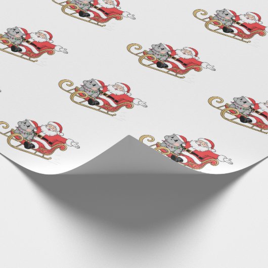 Santa Riding Sleigh met een Moo Deng Baby Hippo Cadeaupapier (Hoek)