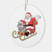 Santa Riding Sleigh met een Moo Deng Baby Hippo Keramisch Ornament (Links)