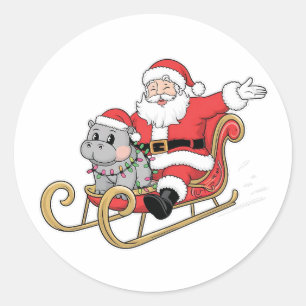 Santa Riding Sleigh met een Moo Deng Baby Hippo Ronde Sticker