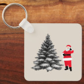 Santa standing near pine tree sleutelhanger (Voorkant)