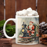 Santa Train Christmas Koffiemok<br><div class="desc">Verras je kleintjes met feestelijke design die van elk slokje een vreugdevolle ervaring maken dit vakantieseizoen. Ideaal voor warme cacao, deze charmante mok brengt plezier en vrolijkheid in uw vakantietradities. Creëer voor jou uit Mijn Baby Boutique!</div>