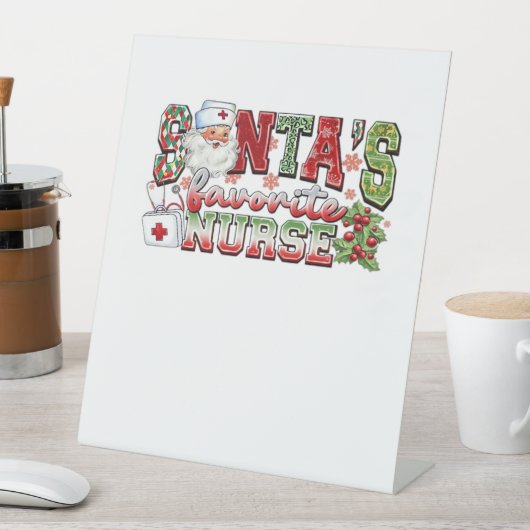 Santa's favoriete verpleegster, vrolijke verpleegs reclamebord met voetstuk (Insitu)