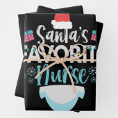 Santa's favoriete zuster Funny Kerstverpleegster Inpakpapier Vel (In situ)