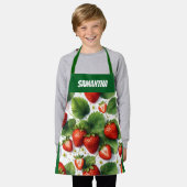 Sappige rijpe verse aardbeien met groene bladeren schort (Gedragen)