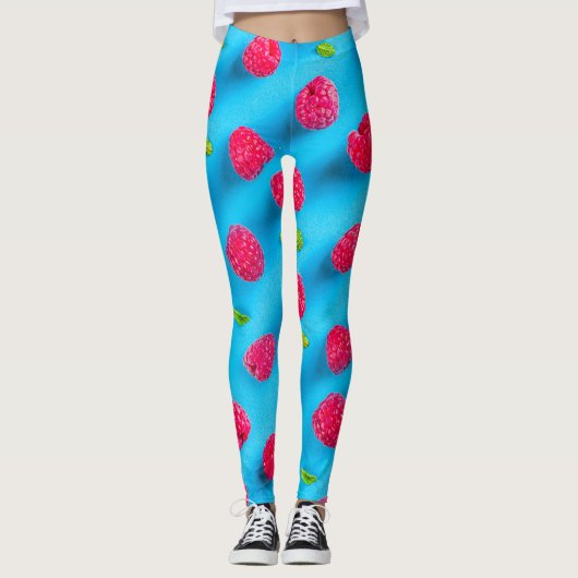 SAPPIGE RODE LYCHEE OP BLAUWE ACHTERGROND LEGGINGS (Voorkant)