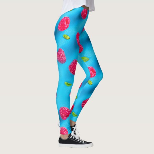 SAPPIGE RODE LYCHEE OP BLAUWE ACHTERGROND LEGGINGS (Rechts)