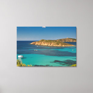 Sardijns helderblauw zee & lucht met boten en klif canvas afdruk
