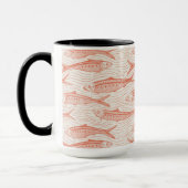 Sardines in beweging in koraal en wit mok (Links)