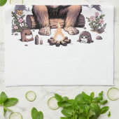 Sasquatch houdt bloemen vast theedoek (Gevouwen)