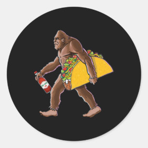 Sasquatch met een taco en een fles hete saus ronde sticker