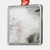 Satellietuitzicht van een massaal winterstorm bove metalen ornament (Links)