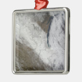 Satellietuitzicht van sneeuw en koud metalen ornament (Links)