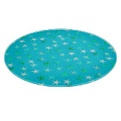 Satin sterren, bleek groen en blauw op turquoise snijplank (Hoek)