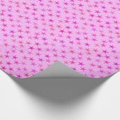 Satin sterren, orchidee op bleek roze cadeaupapier (Hoek)