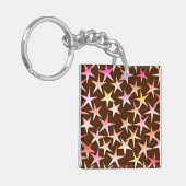 Satin sterren, roze op chocolade sleutelhanger (Voorkant Links)