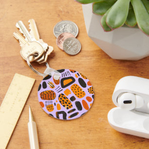 "Savanne Pop: Tribale Vibe in Oranje & Zwart" Sleutelhanger