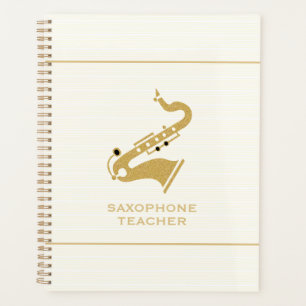 Saxofoon illustratie in gouden glitter textuur planner