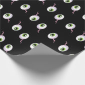 Scale oogballen op zwart cadeaupapier (Hoek)