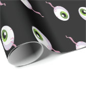 Scale oogballen op zwart cadeaupapier (Rol Hoek)