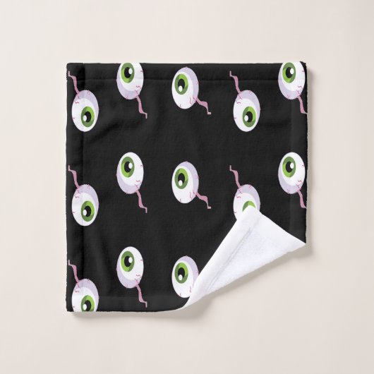 Scale oogballen op zwart washandje (Wasdoekje)