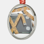 ScaleMeasuringTape021613.png Metalen Ornament (Links)