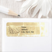 Scallop Seashell op zand Etiket (Insitu)