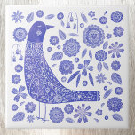 Scandinavische vogel blauw en wit tegeltje<br><div class="desc">Scandinavische volkskunst stijl blauw en wit vogel en bloem design. Originele versie door Nic Squirrell.</div>