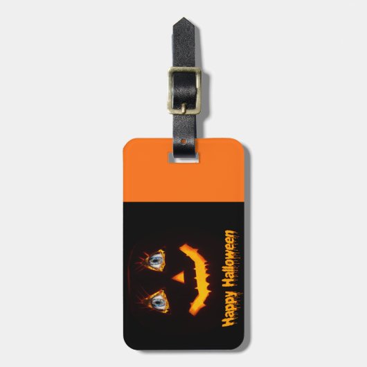 Scary Halloween pumpkin face with fiery blue eye Bagagelabel (Voorkant verticaal)