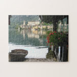 Scenic Lake Orta, Italië Legpuzzel<br><div class="desc">Lying in the foothills of the Alps near the Swiss border, romantic Lago di Orta (Lake Orta) is nestled among a dark green forest and rocky hills.— may seem far away today but it will be your own to enjoy when completed. The island in the middle of Orta is home...</div>