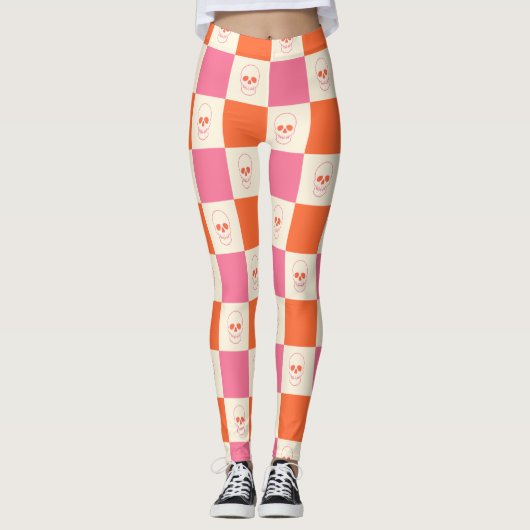 Schaakbordschedels in roze, Sinaasappel en crème Leggings (Voorkant)