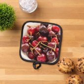 schaal met kersen pannenlap (Top down)