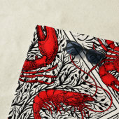 Schaaldieren in rood, zwart en ivoor strandlaken (In situ)