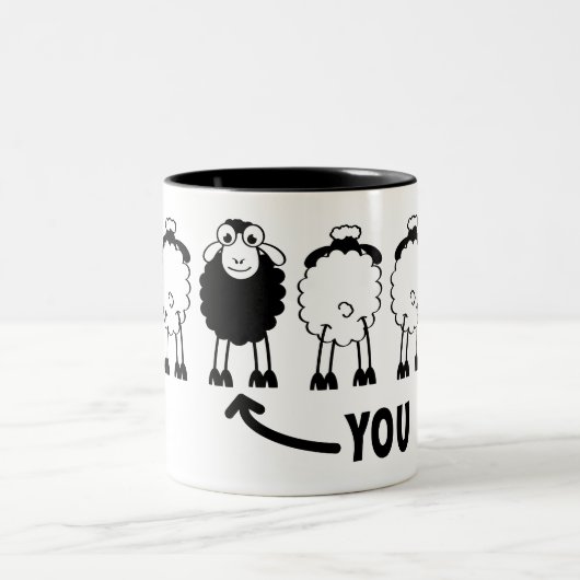 Schaap, witte of zwarte schapen van de familie tweekleurige koffiemok (Center)