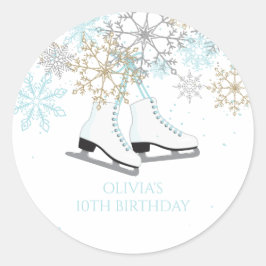 Schaatsende sneeuwvlokken blauw en goud ronde sticker