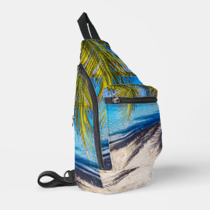 Schaduwen op het strand sling bag
